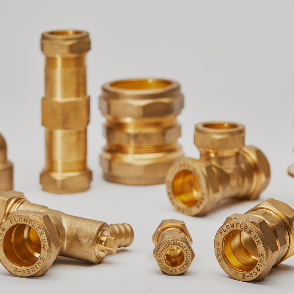 Group of brass compression fitting pipe fittings