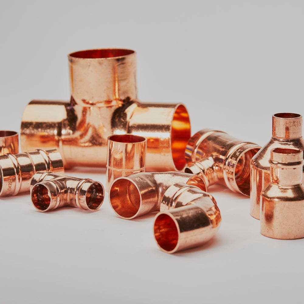 Group shot of copper pipe fittings
