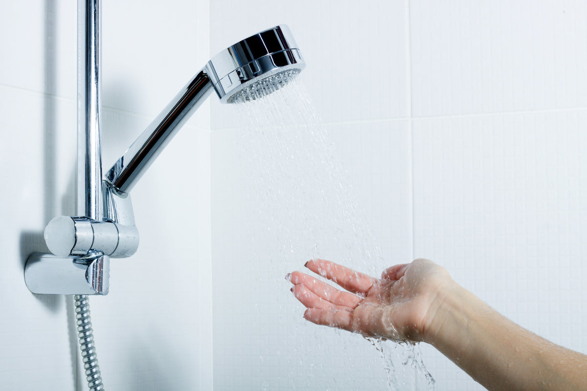 Shower running in a modern bathroom